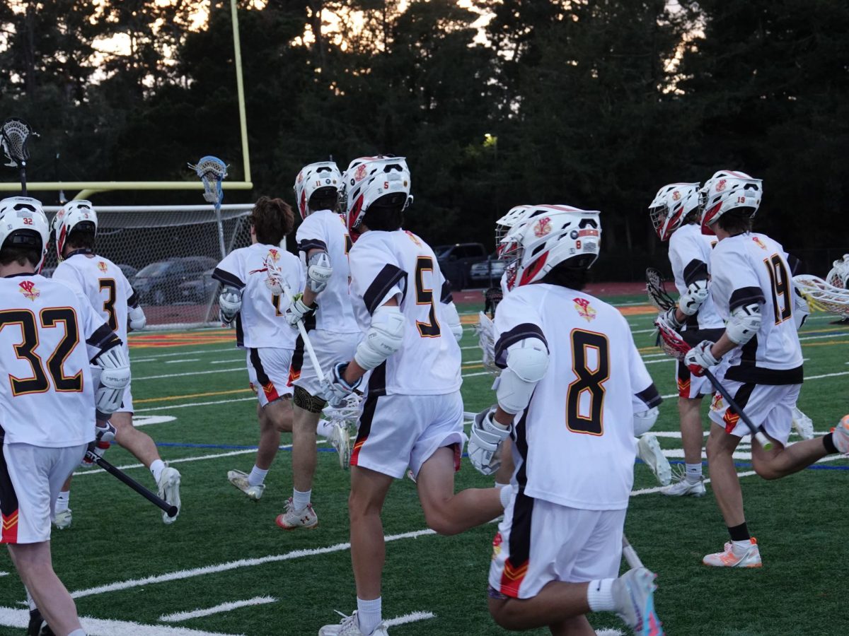 Lacrosse running at halftime against Hollister