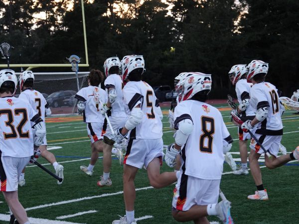 Lacrosse running at halftime against Hollister