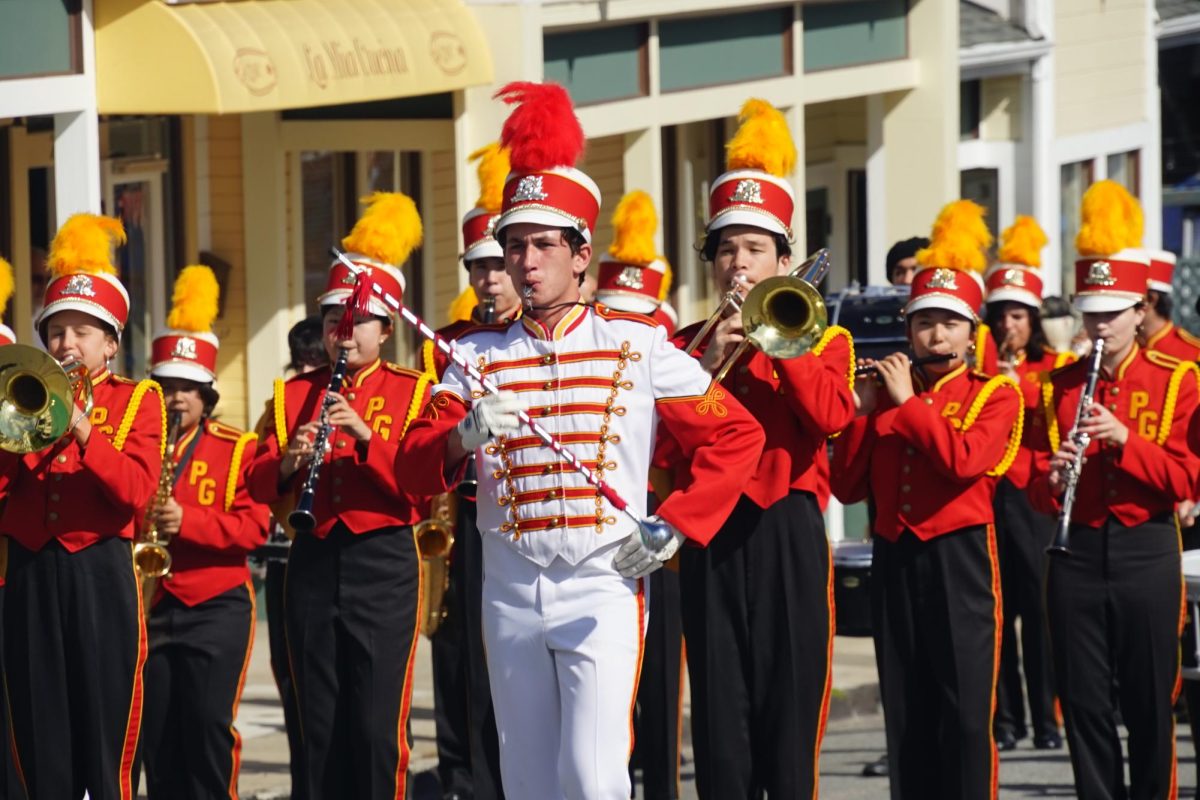 Drum Major Conor O'Brien leading the Breaker Band through the parade